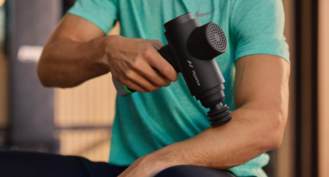 Hyperice Hypervolt 2 Pro and Heated Head - Featuring Quiet Glide Technology - Handheld Percussion Massage Gun | 5 Speeds, 5 Interchangeable Heads | Helps Relieve Sore Muscles and Stiffness