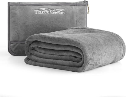 Three Geese Travel Blanket & Pillow 2-in-1 – Ultra-Soft Fleece Airplane Blanket 65"x40", Compact Carry Case with Luggage Sleeve & Backpack Clip, Lightweight Travel Essentials for Flight, Camping, Car