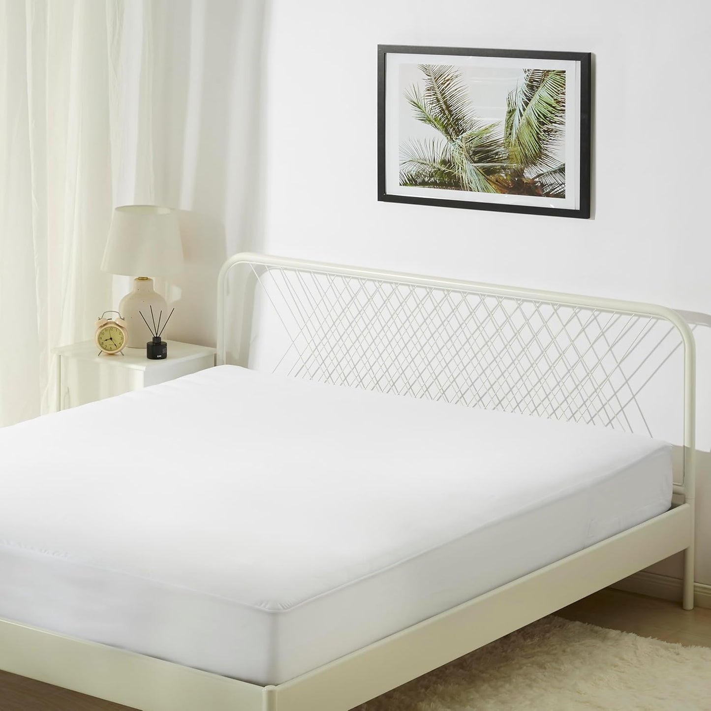 Amazon Basics Waterproof Mattress Protector, Fitted, Silent Protection, Twin, White
