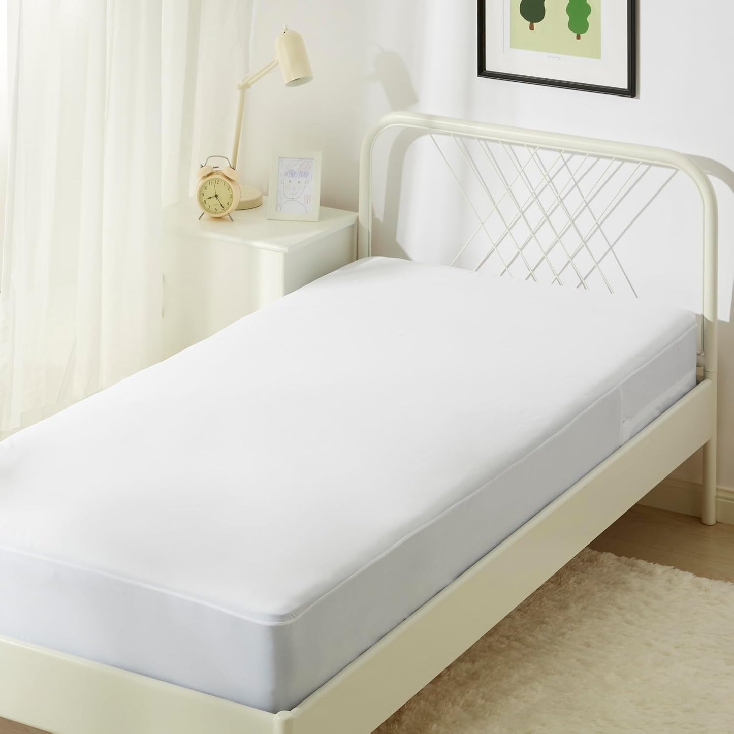 Amazon Basics Waterproof Mattress Protector, Fitted, Silent Protection, Twin, White