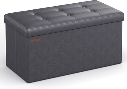 SONGMICS MAZIE Collection - 43 Inches Folding Storage Ottoman Bench, Ottoman with Storage, Foot Rest Stool, Load 660 lb, for Living Room, Synthetic Leather, Black ULSF701