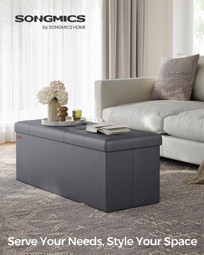 SONGMICS MAZIE Collection - 43 Inches Folding Storage Ottoman Bench, Ottoman with Storage, Foot Rest Stool, Load 660 lb, for Living Room, Synthetic Leather, Black ULSF701