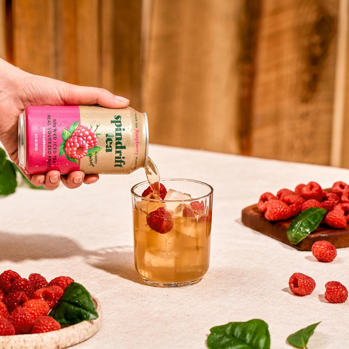 Spindrift Brewed Iced Tea, Raspberry Black Tea, Made with Real Squeezed Fruit, No Carbonation, Slightly Sweet, 12 Fl Oz Cans, Pack of 12 (Only 46 Calories per Can)
