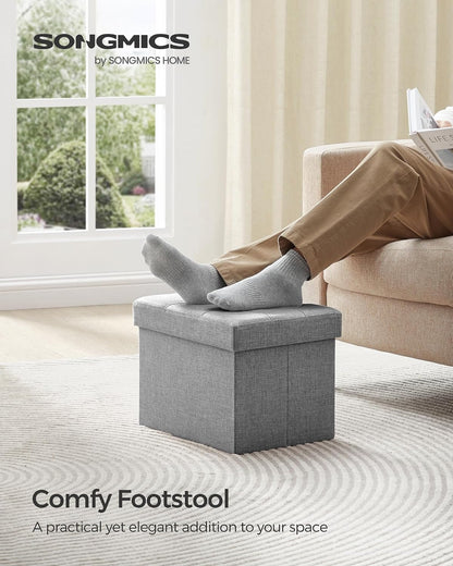 SONGMICS Mazie Collection - Small Folding Storage Ottoman, Foot Rest Stool, 12.2 x 16.1 x 12.2 Inches, 286 lb Load Capacity, for Living Room, Bedroom, Home Office, Dorm, Dark Gray ULSF102G01